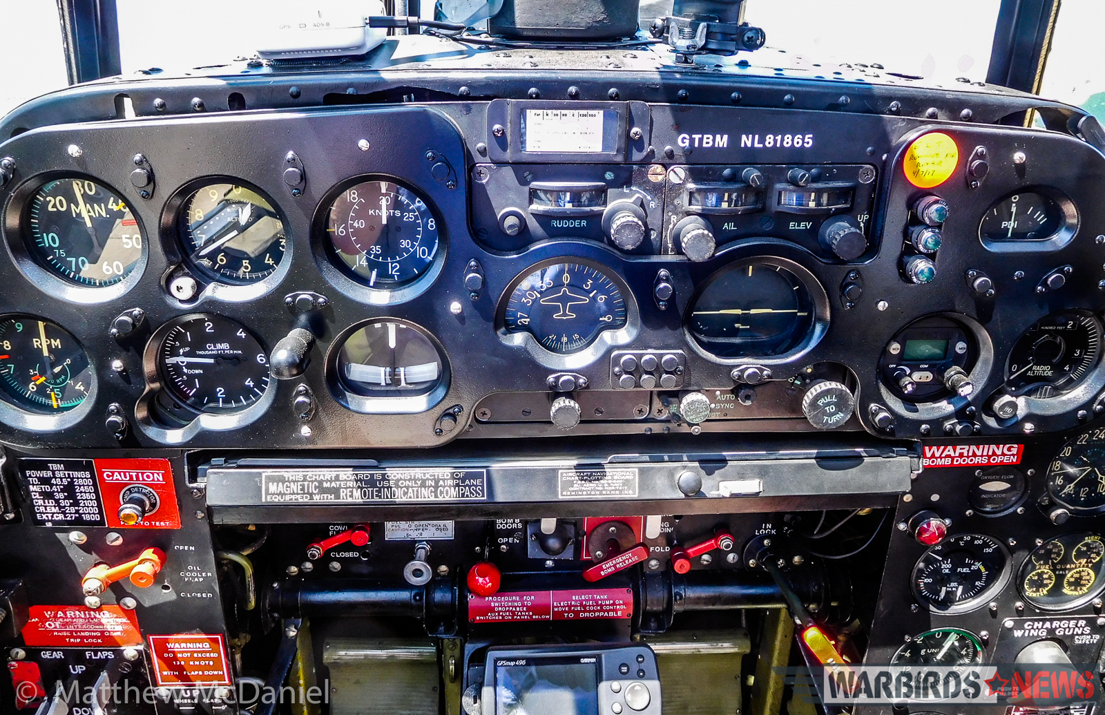 The pilot's main instrument panel on Deckert's TBM remains as close to original as possible. The critical trim indicators are situated front and center. Flap and gear levers are at the lower left corner of photo. (Photo by Matthew McDaniel)