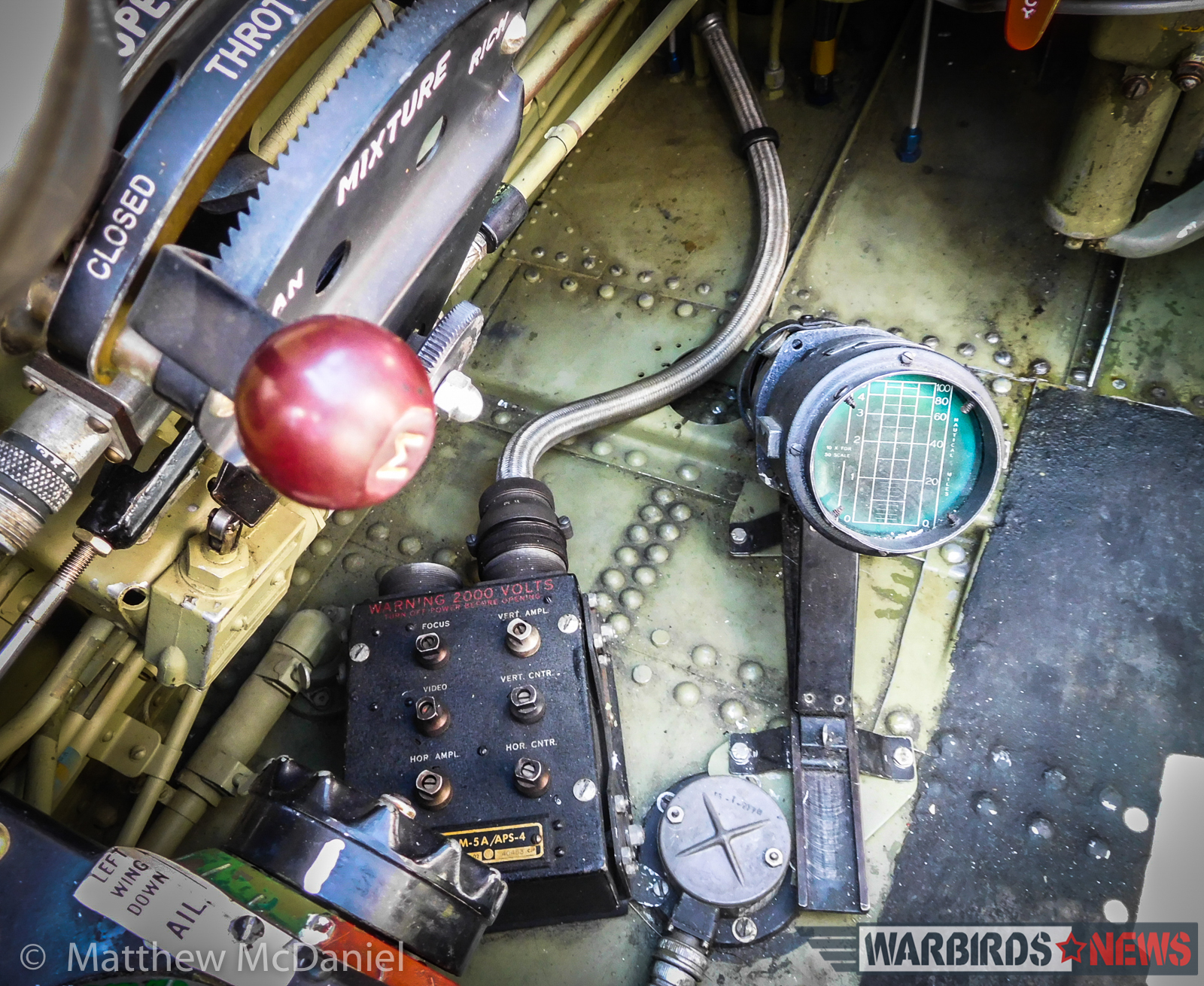 To the pilot's left is the throttle quadrant and the trim controls. Mounted on the floor is an original radar scope, which would have been coupled with the wing-mounted radar pod on so-equipped TBM's (such as Deckert's). (Photo by Matthew McDaniel)