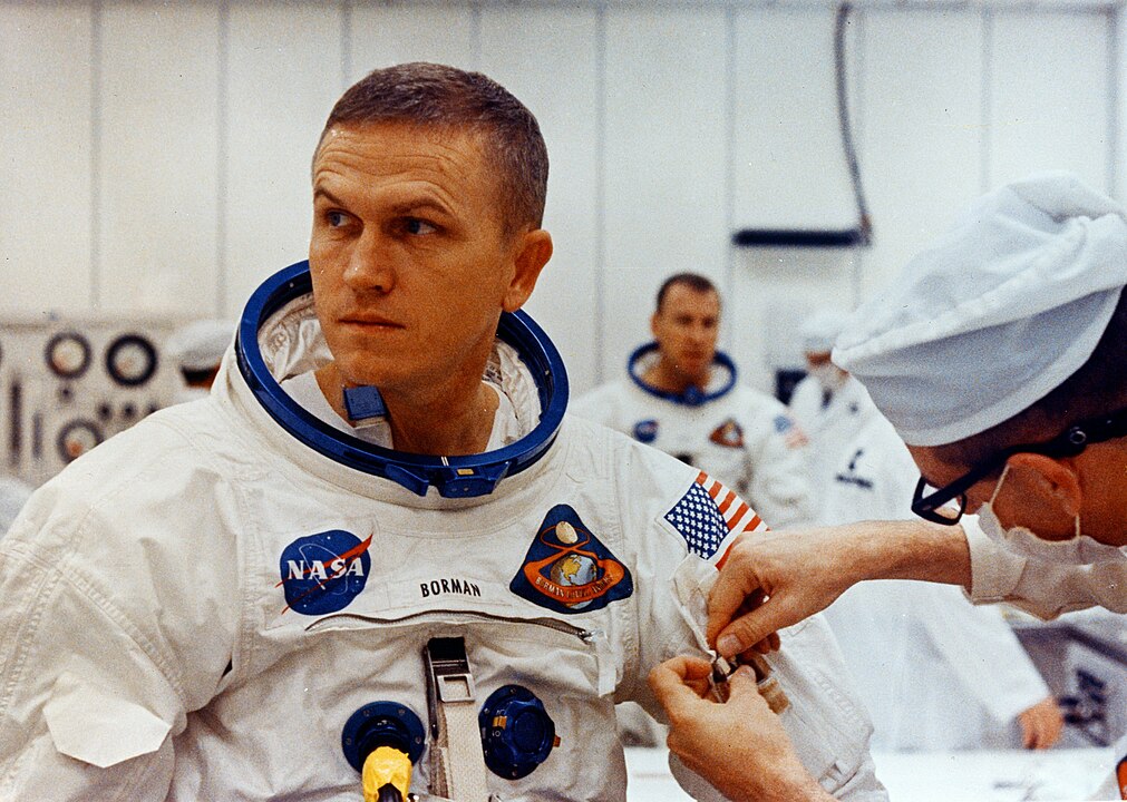 1011px Frank Borman suiting up on launch day