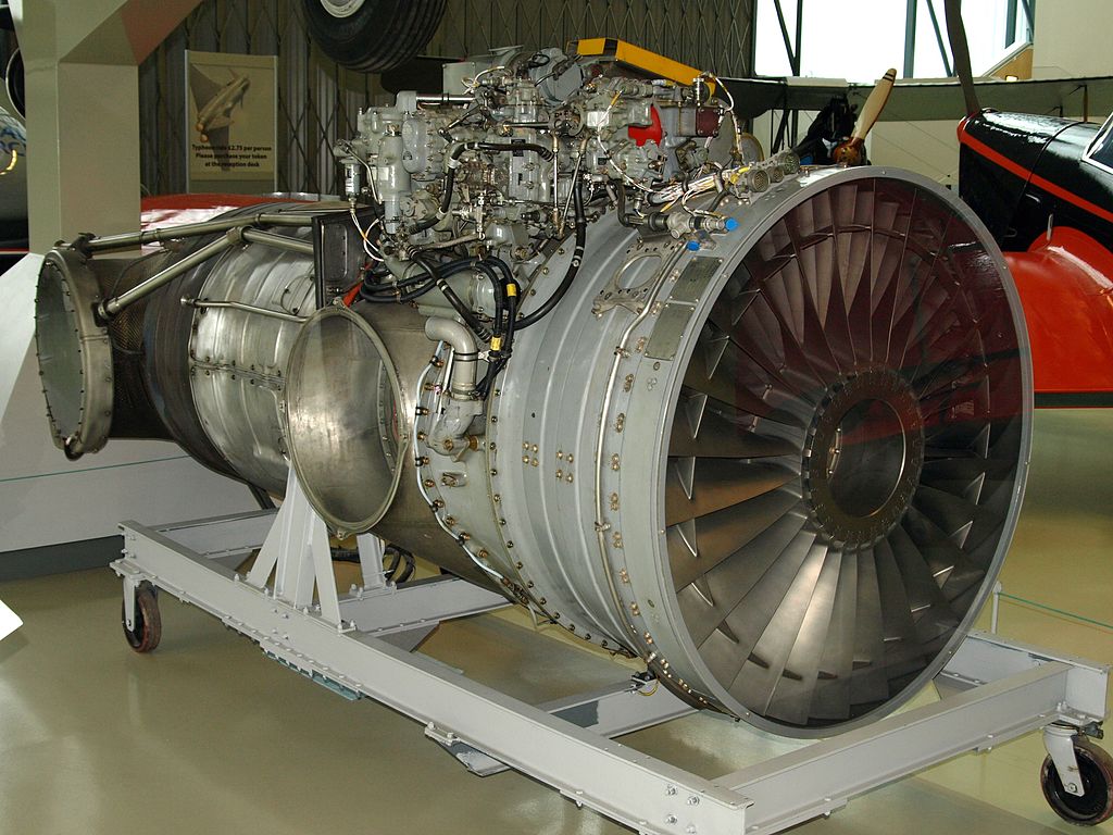 An example of the Rolls-Royce Pegasus engine at RAF Museum Hendon. There are two exhaust ports on either side, visible in this image, which connect to the variable-position nozzles that direct the thrust. (photo via Wikipedia)