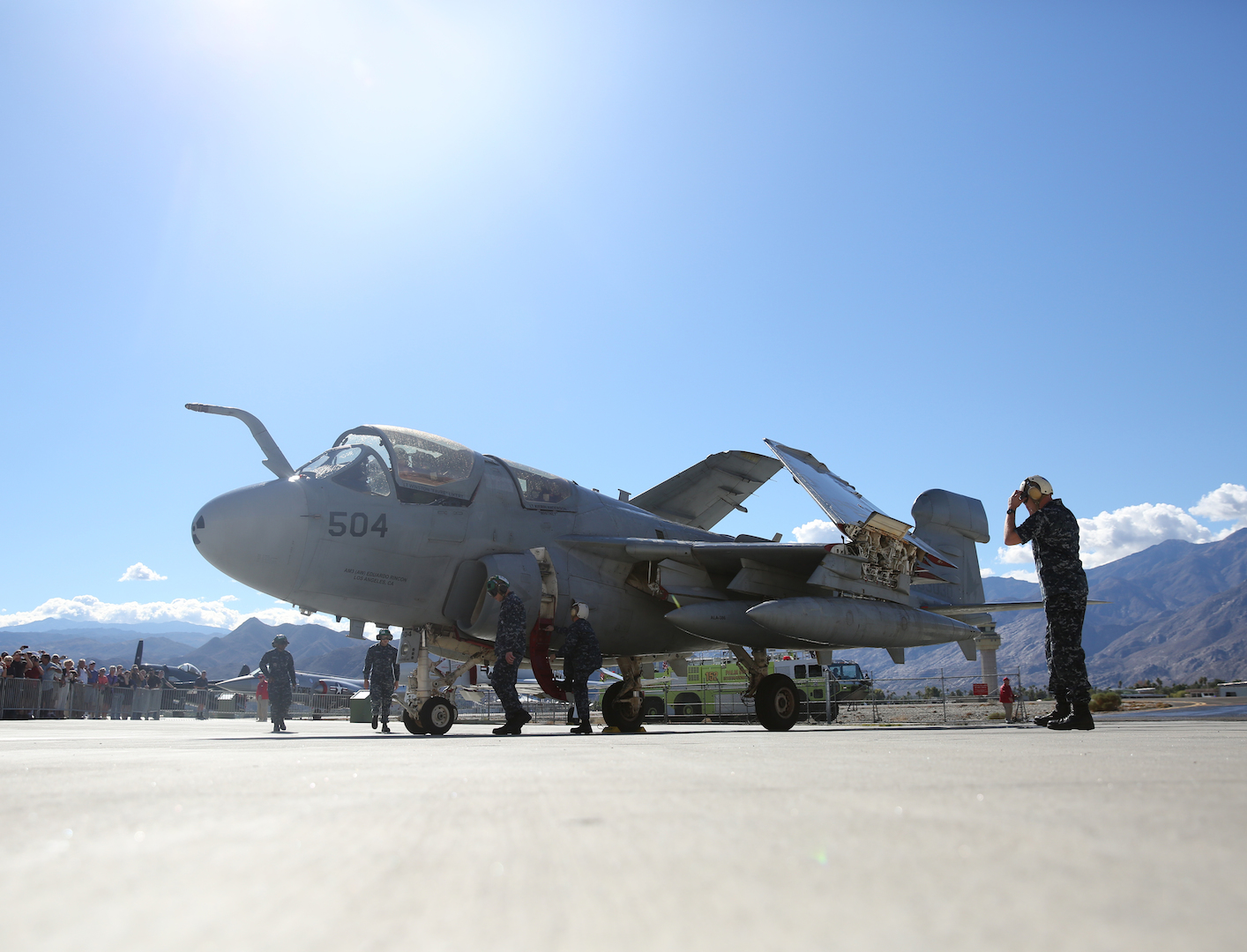 Navy Maintenance team performs post-flight checks on the EA-6B ‘Prowler’ fixed-wing aircraft after it lands for its retirement ceremony at the Palm Springs Air Museum, Nov. 21, 2014. The aircraft was retired after more than 20 years serving the U.S. Navy and will be put on display at the museum. (Official Marine Corps Photo by Lance Cpl. Julio McGraw/Released)