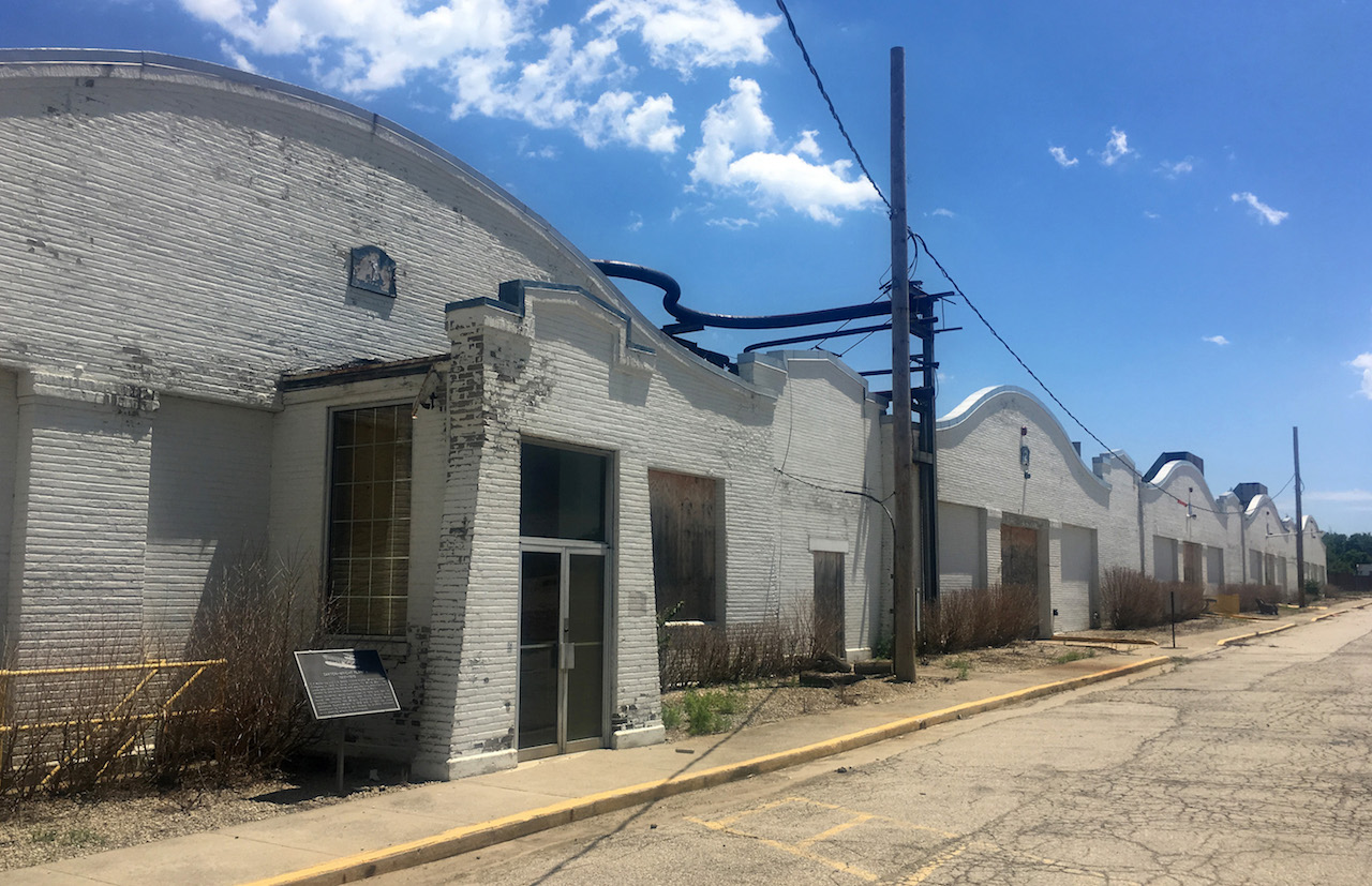 This row of buildings includes, left to right, the original two Wright Company factory buildings that were added by the Inland Division of General motors.