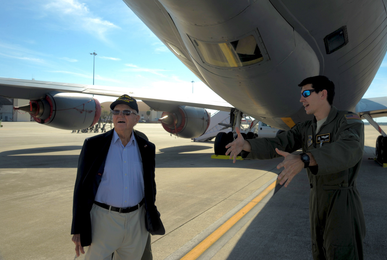 Capt. Daniel Hickox, right, chief of readiness assigned to the 91st Air Refueling Squadron, explains the mission of a KC-135 Stratotanker to Keith Cole, a WWII veteran, at MacDill Air Force Base, Fla., Jan. 18, 2017. Cole was given a tour of the flight line and shown the inside of a KC-135. (U.S. Air Force photo by Airman 1st Class Adam R. Shanks)
