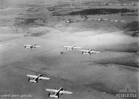 Dutch B-25 Mitchells and crews operating as RAAF (NEI) 18 Squadron on a training flight near Canberra, Australia in 1942. (photo via Wikipedia)