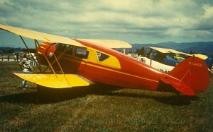 The Waco UIC NC13408 at an air show sometime in the 70's. The plane now sports its original Cadillac blue and white paint scheme.