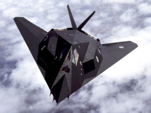 Lockheed F-117 Nighthawk's faceted shape and radar absorbing materials purportedly gave it the the radar cross section of a single ball bearing. (Image Credit: USAF)