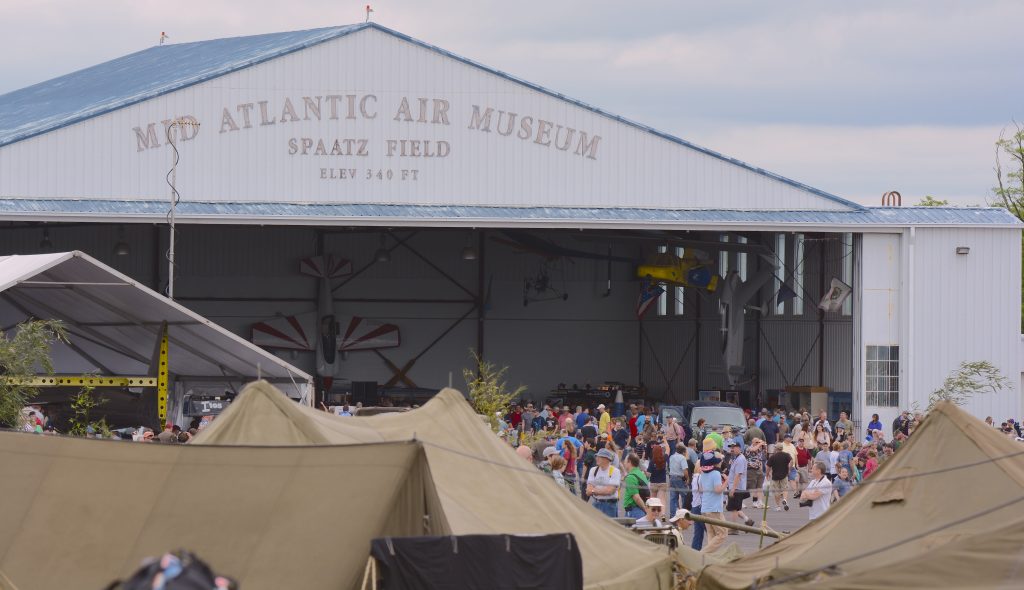 Appreciative crowds fill Spaatz Field for the show, viewed from across an authentic WWII military encampment. (Image Credit: Moreno Aguiari) 
