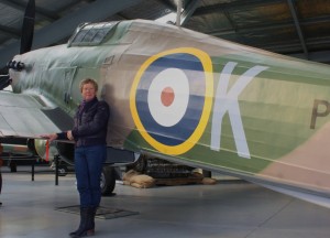 WOW Volunteers Manager Mo Schofield with Hawker Hurricane Replica (Image Credit : WOW)