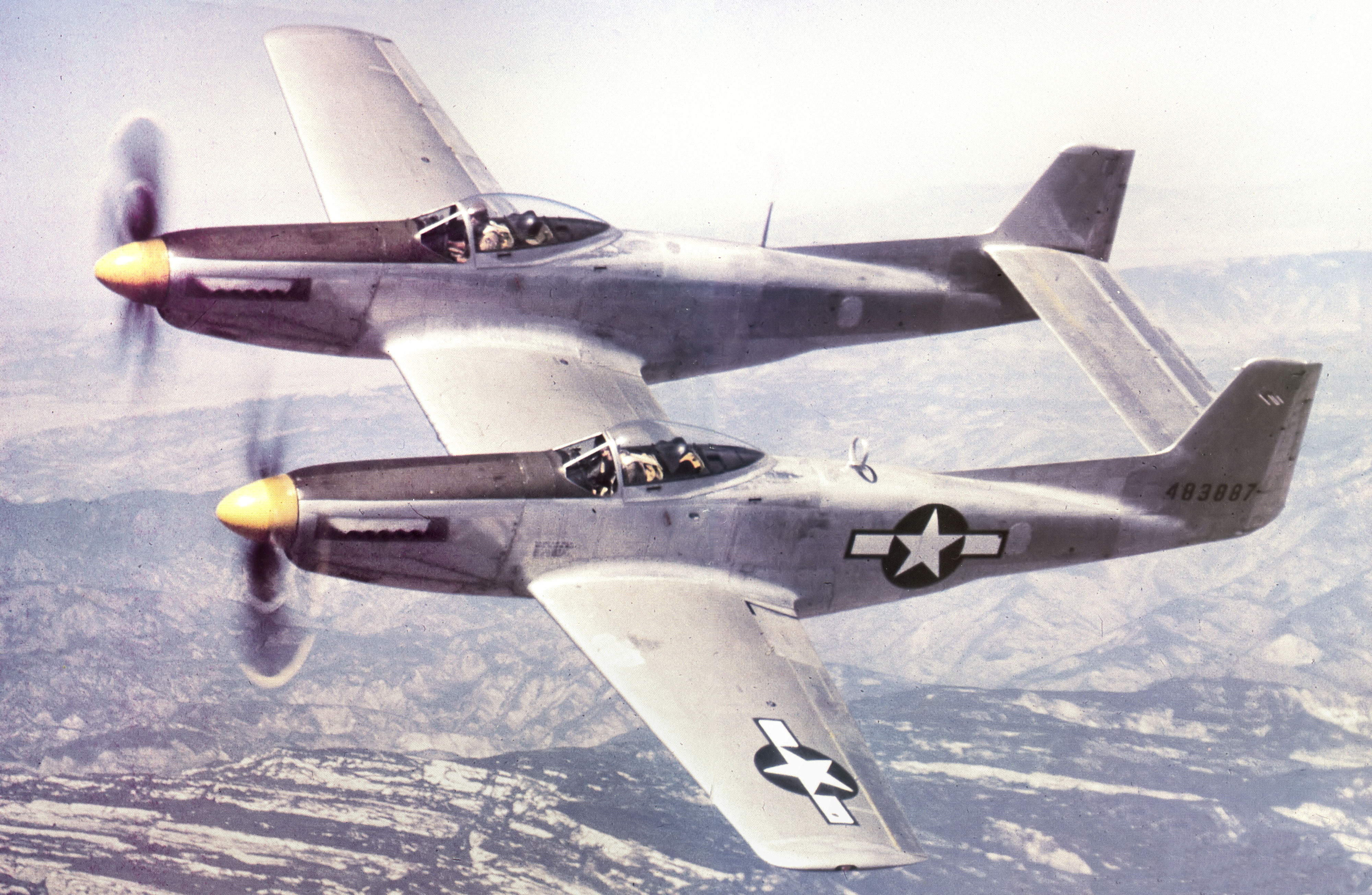 North American XP-82 Twin Mustang 44-83887 on a test flight over the Sierras in 1945.