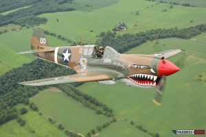Air-toAir shot of the Curtiss P-40 Warhawk "Jacky C" operated by the American Airpower Museum. (Image Credit: Tom Pawlesh)