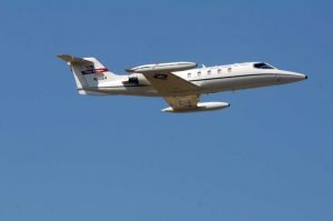 Learjet C-21A makes one last pass over its airfield in Fargo, North Dakota before making it's final flight to Dayton, Ohio.  (Image Credit: US Air National Guard)
