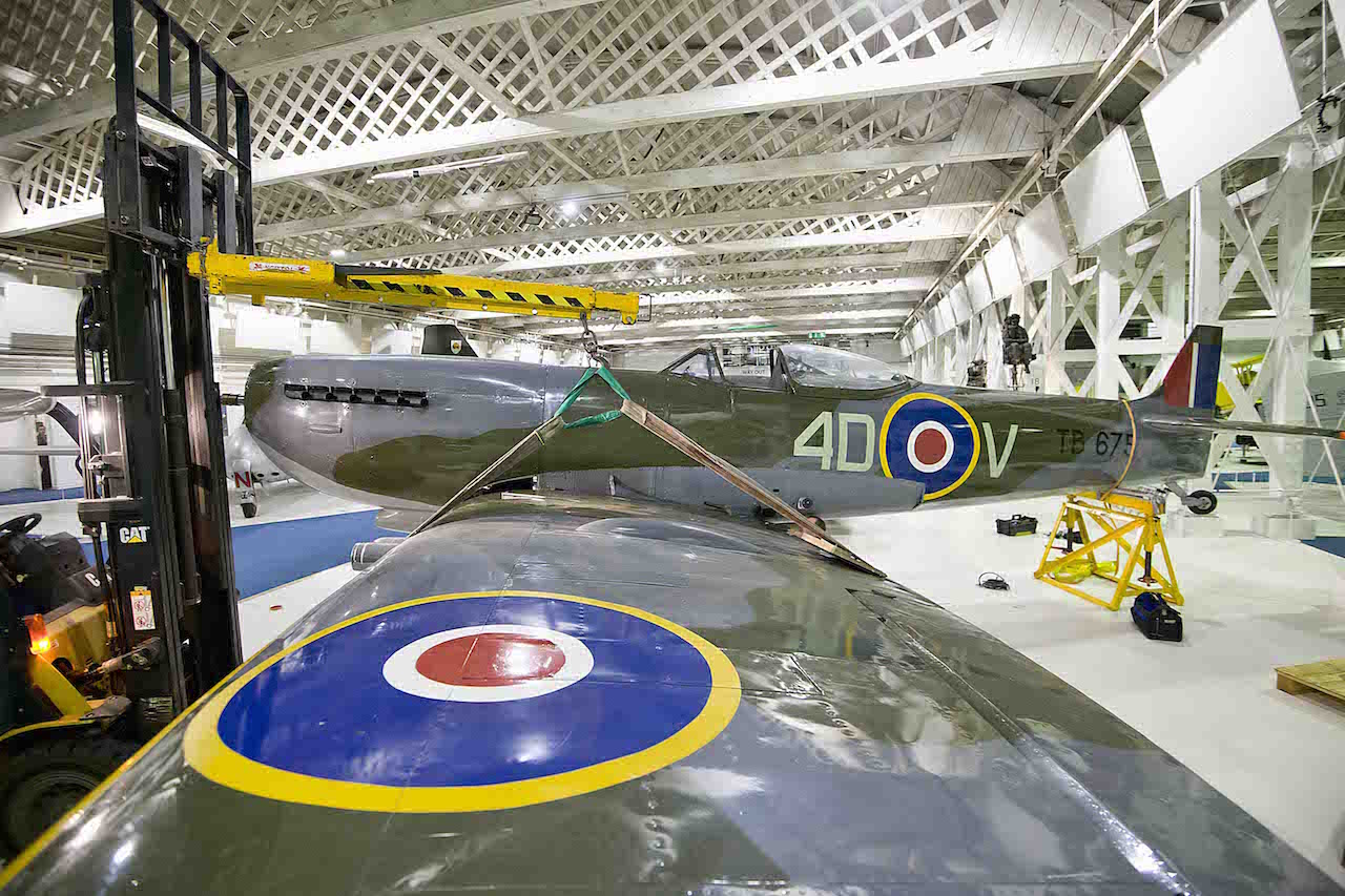 Spitfire Mk16 assembly inside the museum ('©Trustees of the Royal Air Force Museum’)