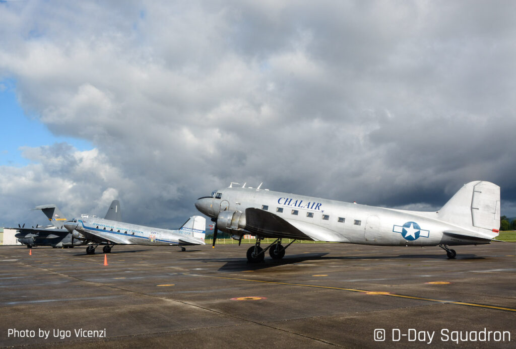 The Swedish DC-3 'Daisy," in the background, flew all the way from Sweden to take part to the celebrations. DC-3 Chalair, operated by the Battisti family flew from the outskirts of Paris. Photo by Ugo Vicenzi.