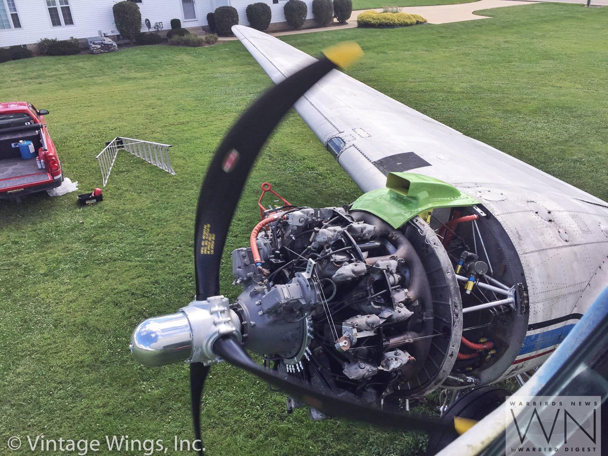 A video still showing the right engine at work! (photo via Vintage Wings, Inc.)