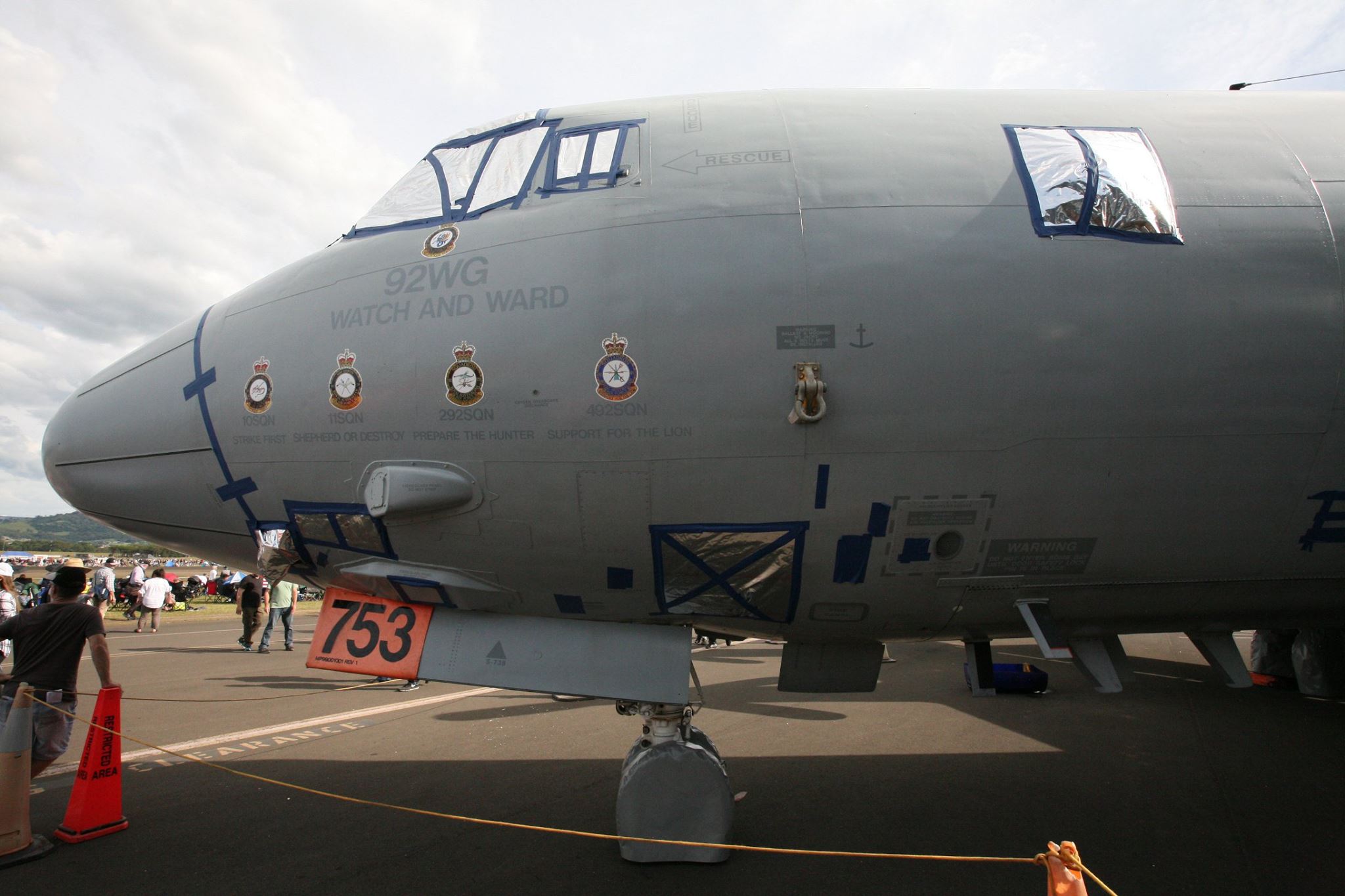 A closeup of A9-753 showing her squadron heritage. Note the tape covering panels lines and the silver foil window coverings. These were put in place to protect the integrity of the aircraft while the Australian Department of Defense sought permission to formally hand over ownership to HARS. The museum will soon get to work preparing the Orion to fly once more. (photo by Phil Buckley) 