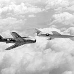 This 1950s photograph shows the Douglas D-558-II and the North American F-86 Sabre chase aircraft in-flight. Both aircraft display early examples of swept-wing airfoils.