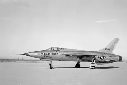 Side view of a F-105B (serial #54-0102) photographed on Rogers Dry Lakebed at Edwards Air Force Base, Calif. in 1959.