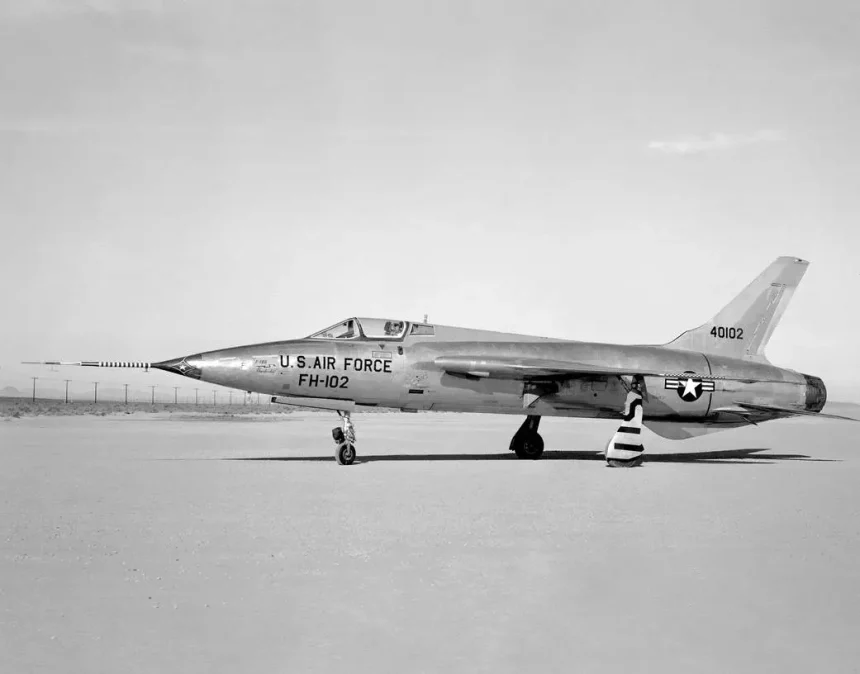Side view of a F-105B (serial #54-0102) photographed on Rogers Dry Lakebed at Edwards Air Force Base, Calif. in 1959.