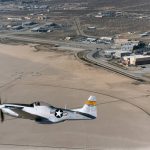 Flight Test Files: North American P-51 Mustang - Learning to Trust Laminar Flow 10 The huge compass rose on Rogers Dry Lake formed a backdrop for a genuine National Advisory Committee for Aeronautics (NACA) P-51 Mustang owned and flown by William C. Allmon.
