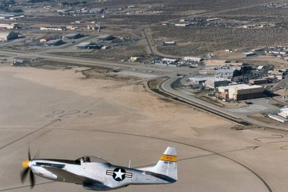 The huge compass rose on Rogers Dry Lake formed a backdrop for a genuine National Advisory Committee for Aeronautics (NACA) P-51 Mustang owned and flown by William C. Allmon.