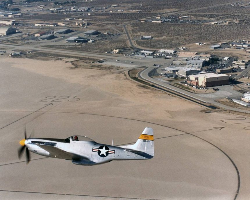 The huge compass rose on Rogers Dry Lake formed a backdrop for a genuine National Advisory Committee for Aeronautics (NACA) P-51 Mustang owned and flown by William C. Allmon.