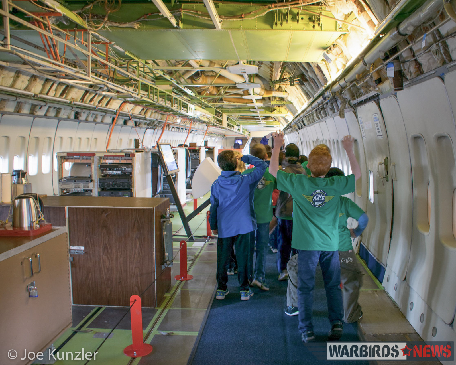Aerospace Camp Experience (ACE) kids walking through the prototype 747. (photo by Joe Kunzler)