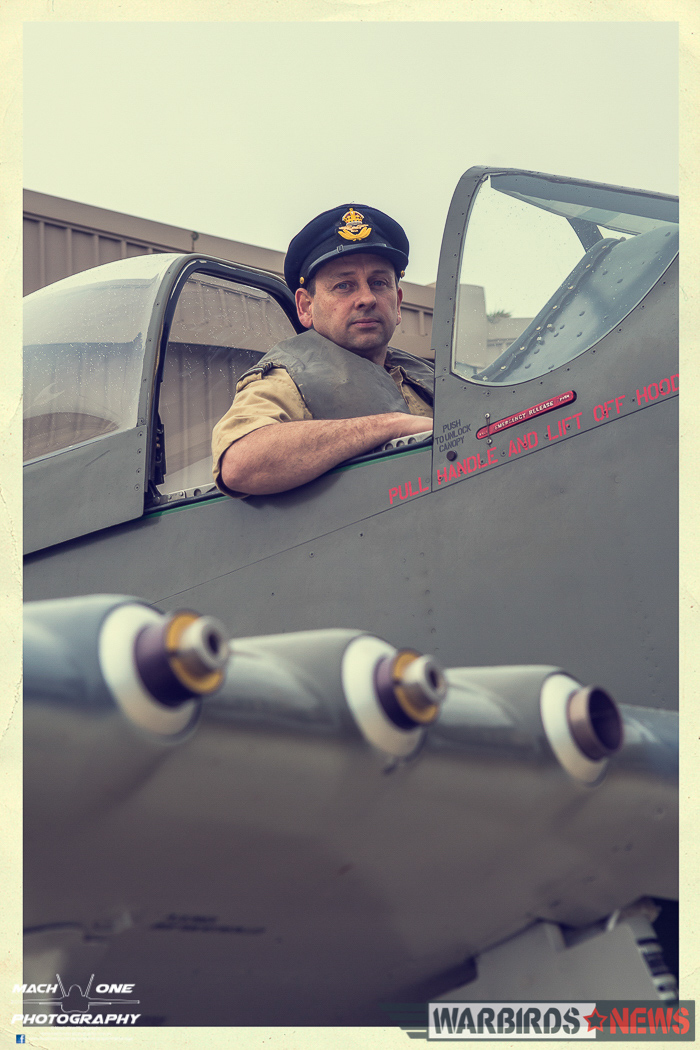 A re-enactor sitting in the Mustang's cockpit. (photo by Matt Savage)