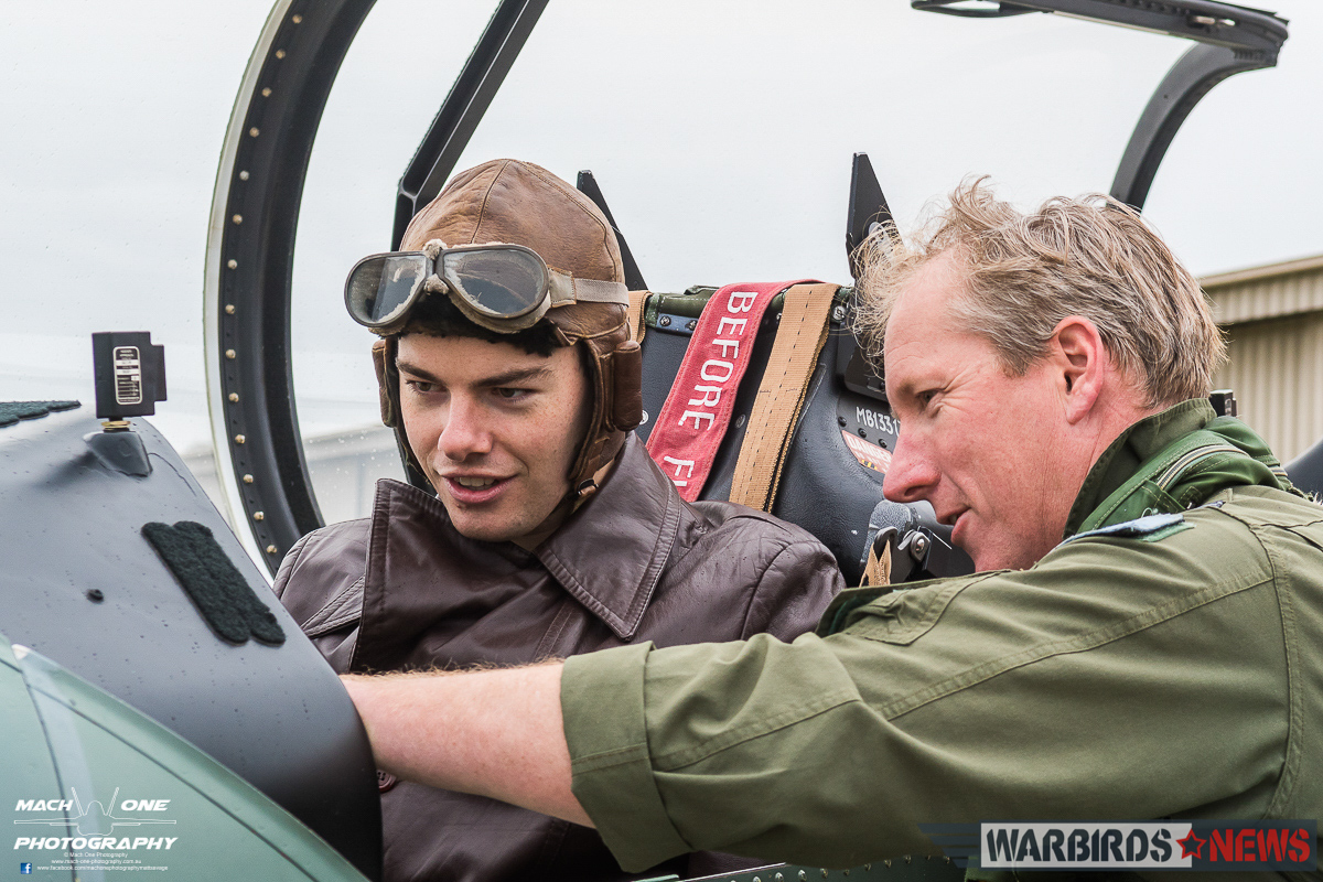 Flt.Lt. Burrows showing the PC-9 off to the WWI re-enactor sitting in the cockpit. (photo by Matt Savage)