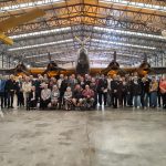 77 squadron association in front of halifax bomber