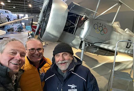 A candid moment of Hans Storck and Rainer Berndt with the curator of the Polish Aviation Museum in front of Ernst Udets Curtiss Hawk II Hans Storck