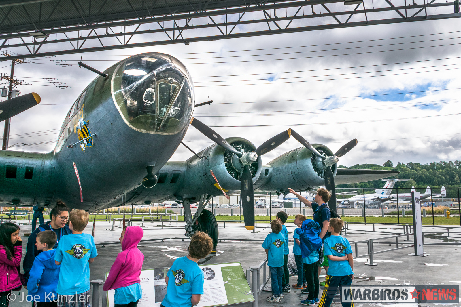 ACE Campers gaze at the Museum of Flight's Boeing B-17F Flying Fortress known as 'Boeing Bee'. (photo by Joe Kunzler)