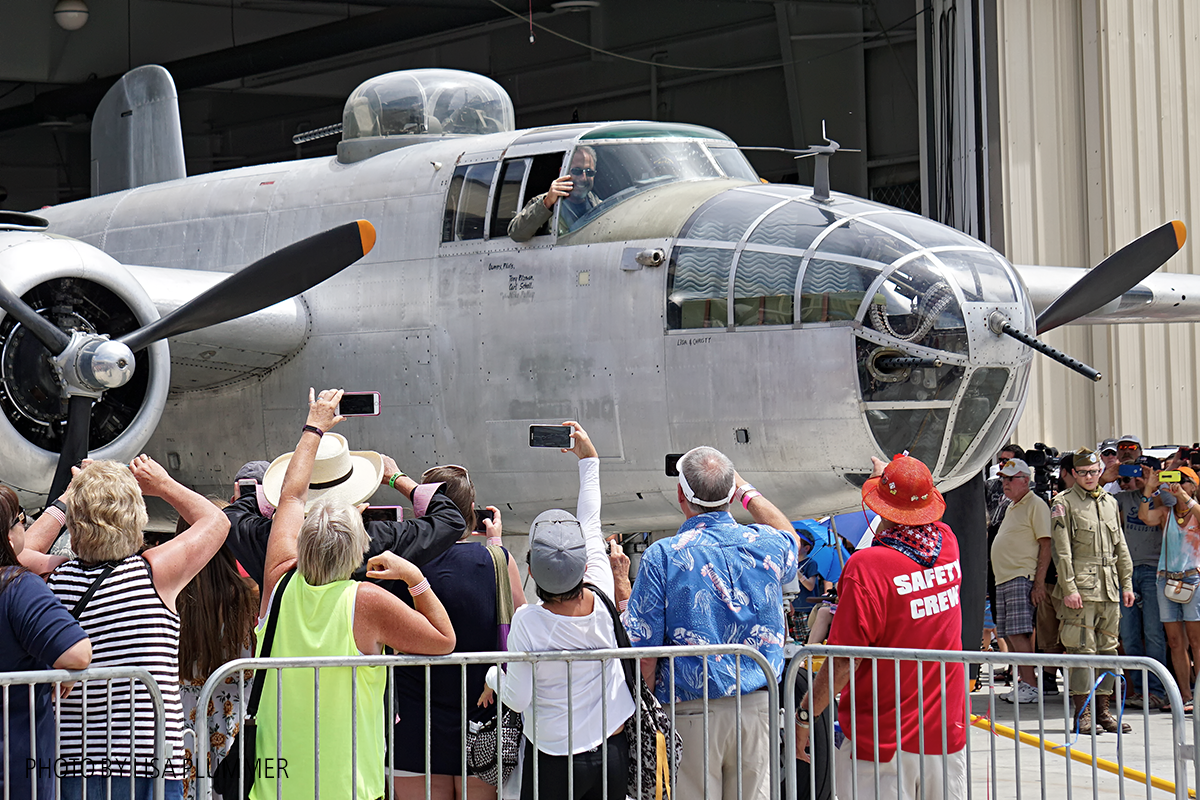 Aero Trader own B-25 piloted by Carl Scholl roll out for flower drop. (photo by Lisa Plummer)