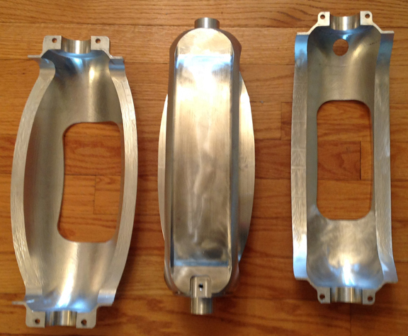 The newly-machined CAT shell halves for the air intake diverter. (photo via Tom Reilly)