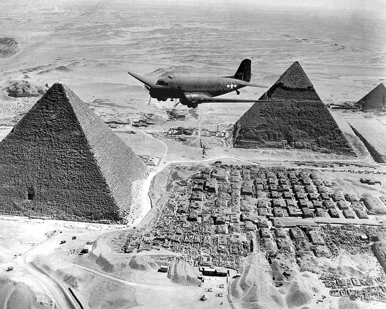 Air Transport Command C 47 over the pyramids