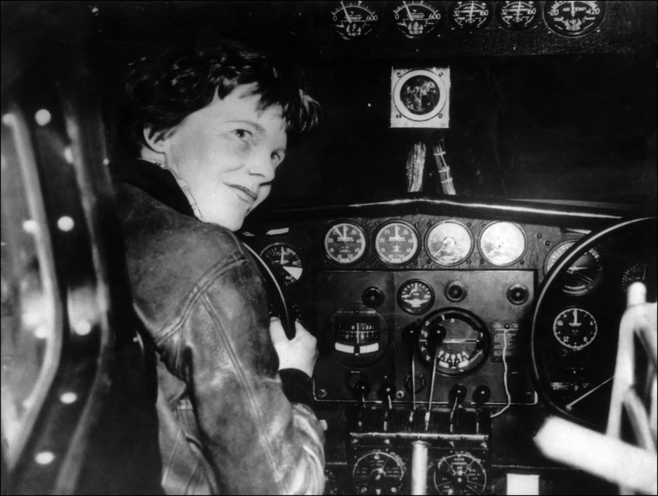 Amelia Earhart in the cockpit of her Lockheed Electra 10E NR16020 large