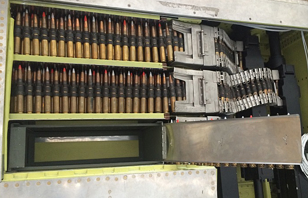 The aft tray in the picture only has one row of bullets on top of a fold-up lid so the ammo tray can double as a storage compartment for tools, etc. (photo via Tom Reilly)