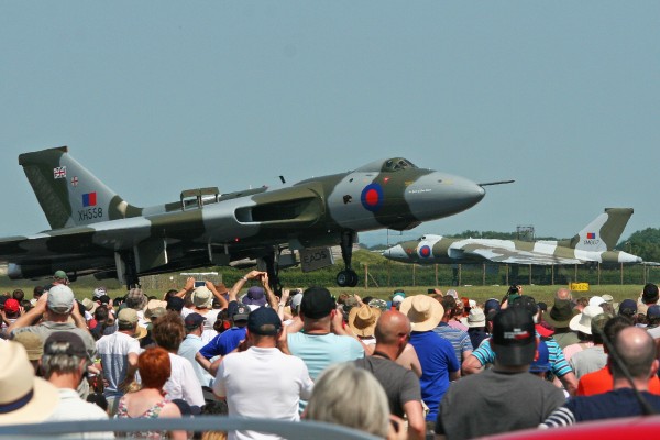 Vulcan XH558 landing after her aerial display earlier this year at the Waddington Air Show with static display XM607 in background. (Image Credit: Alan Wilson CC 2.0)