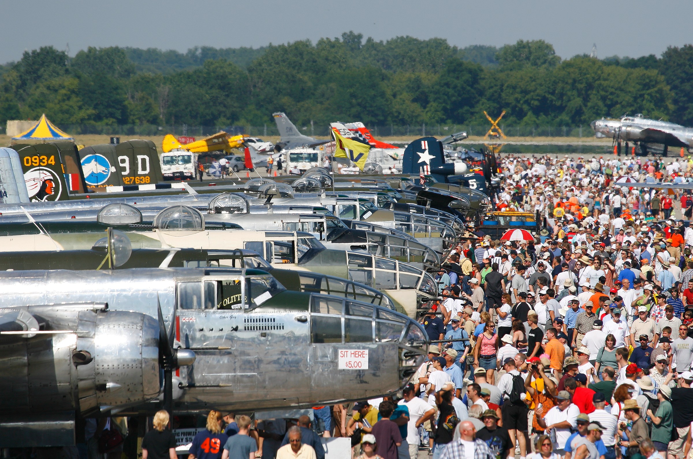 B 25 Mitchell line up with crowd 2007 Thunder Over Michigan Photo Courtesy of Roger Cain 1