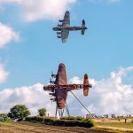 BBMF Lancaster PA474 flies past the newly installed Bomber County Gateway Lancaster sculpture On Freedoms Wings on 11th September 2025. Photo Claire Hartley