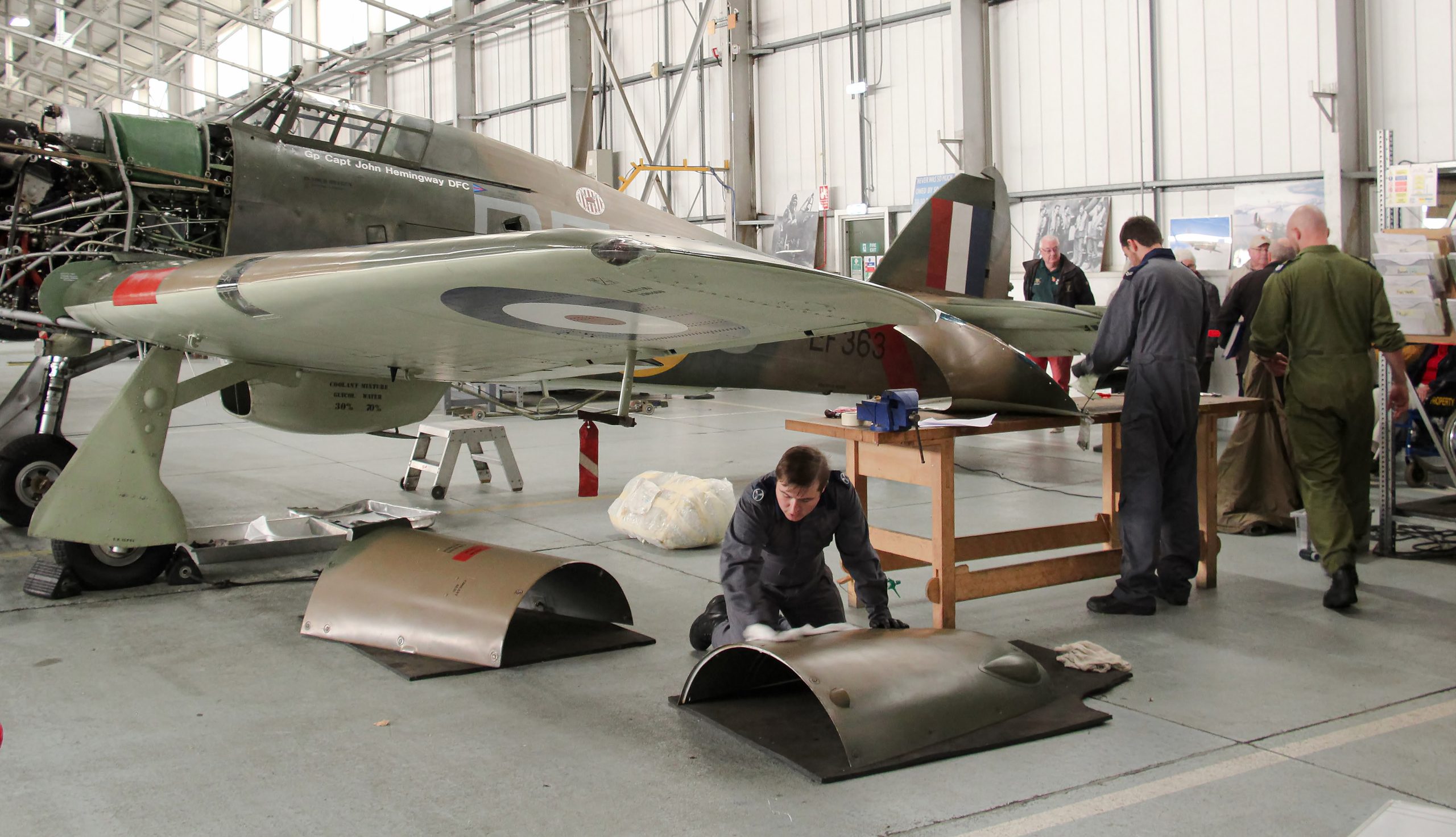 BBMF technicians at work around Hurricane Mk II LF363 in October. Photo Clive Rowley scaled