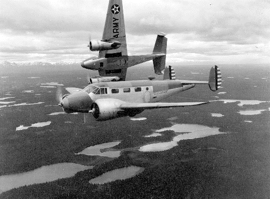Beechcraft F-2 Expeditor reconnaissance aircraft near Ninilchick, Alaska, June 5, 1941. The F-2 was a photo-reconnaissance version based on B18.(USAAC photo)