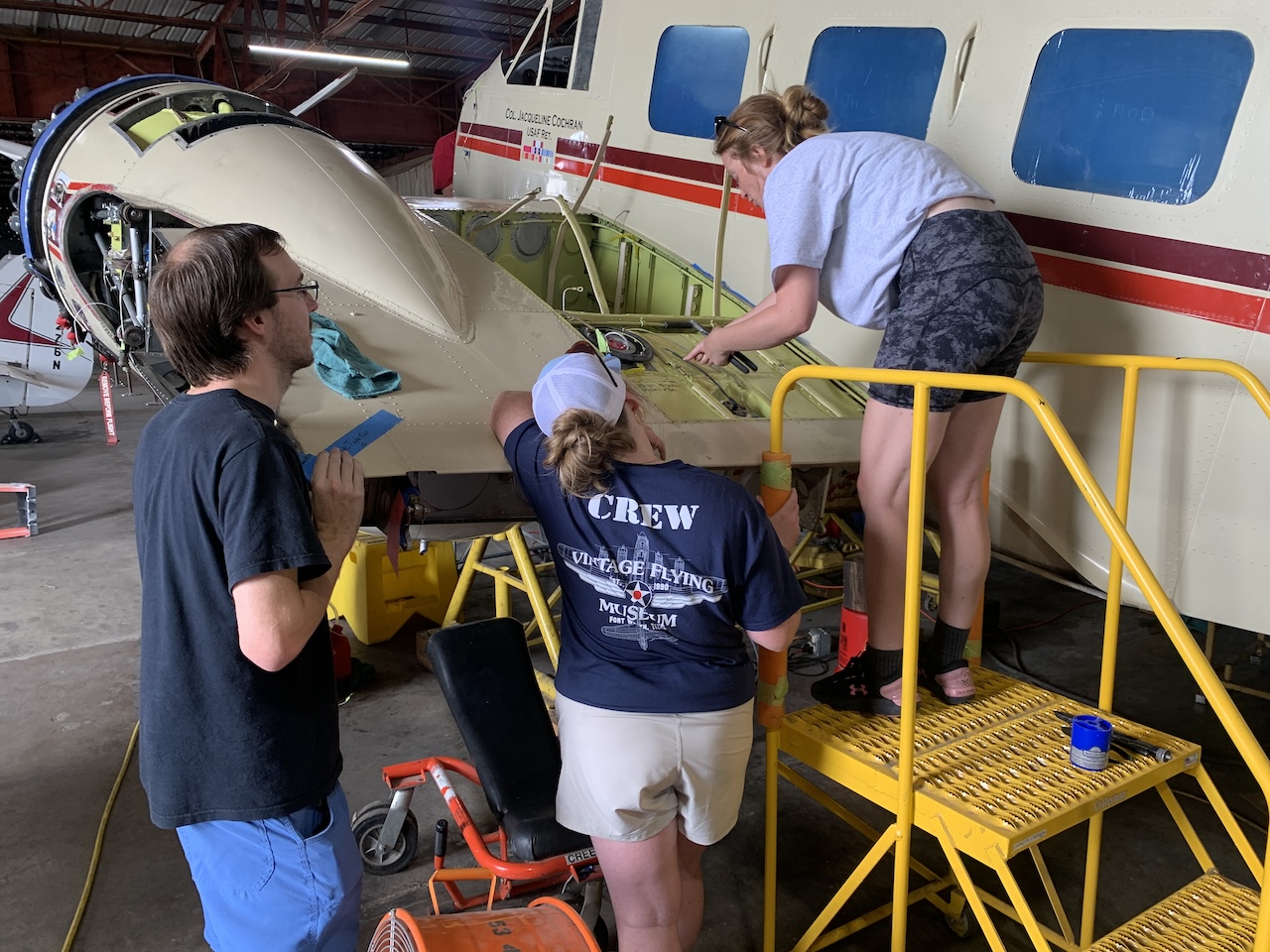 Benjamin Sharlais and Maggie completing fuel tank isntallation