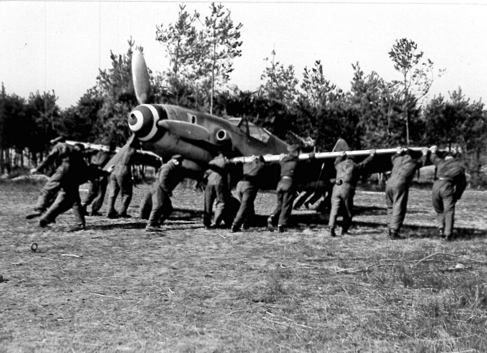 Visconti's Bf-109G being pushed in the sheltered area of Lonate Pozzolo airfield. ( Luigino Caliaro Archive)