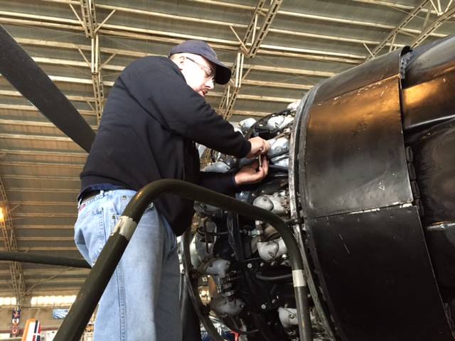 Bill Gorin working on one of the Invader's P&W R-2800 engines. (photo via CAD A-26 Invader Squadron)