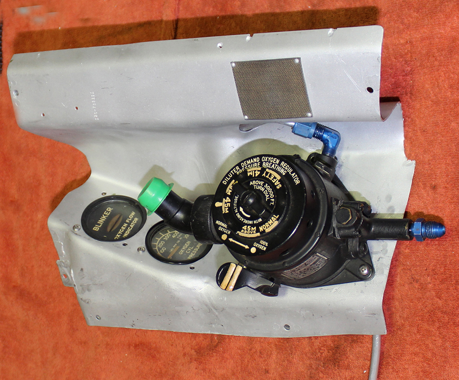 The pilot's oxygen diluter with its associated gauges mounted to the removable cockpit panel. (photo via Tom Reilly)