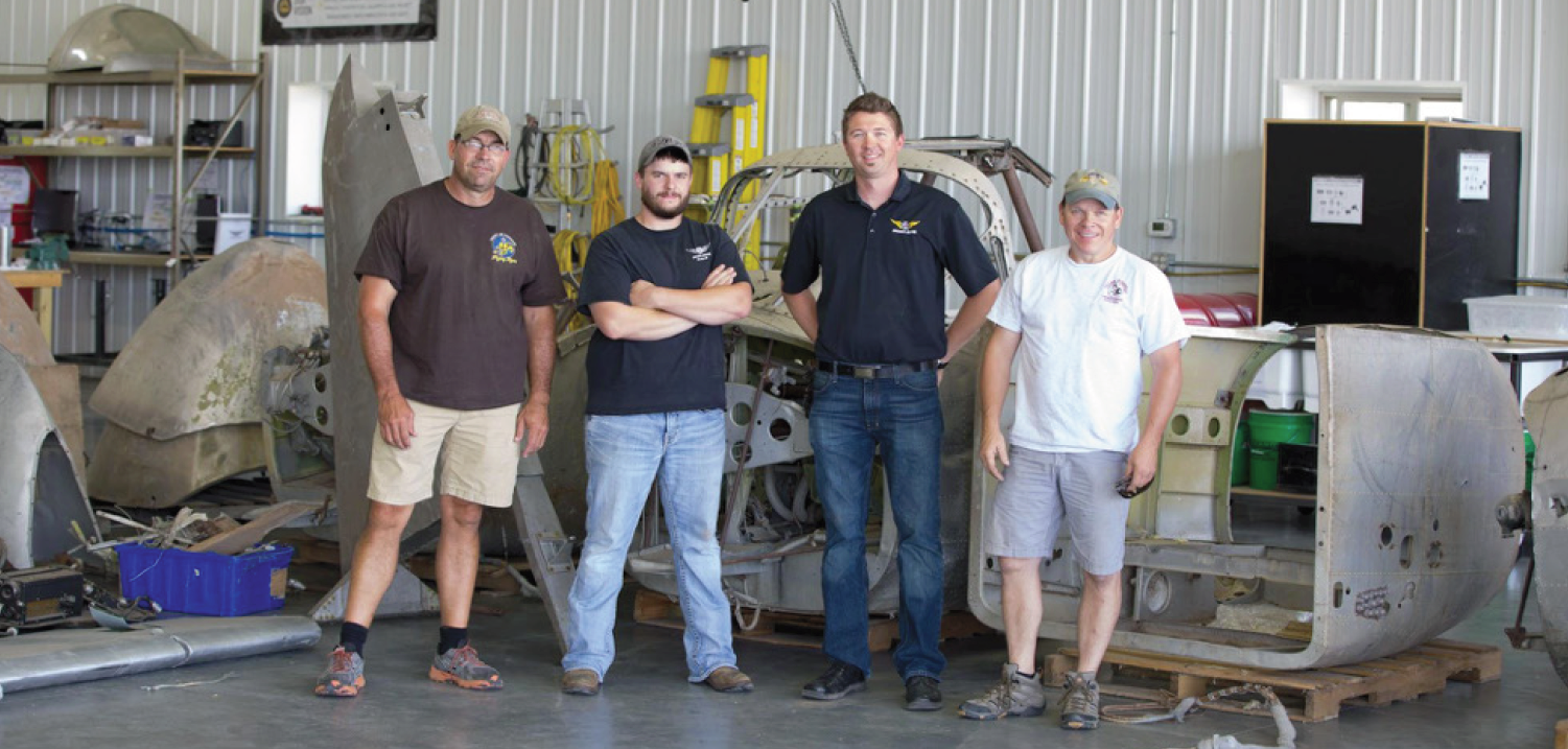 Left to right, Brooks Hurst, Tye Halvas (AirCorps Maintenance Manager), Erik Hokuf (AirCorps’ General Manager), and United States Congressional Representative Sam Graves of the Missouri Sixth District.