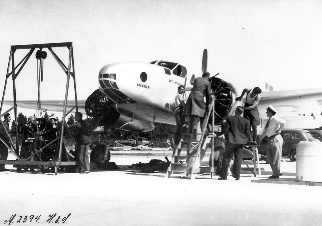 Caproni Ca.310 LN DAK Carrier Pigeon being worked on by mechanics during its time with Det Norske Luftfartselskap DNL Norwegian Aviation Museum 1