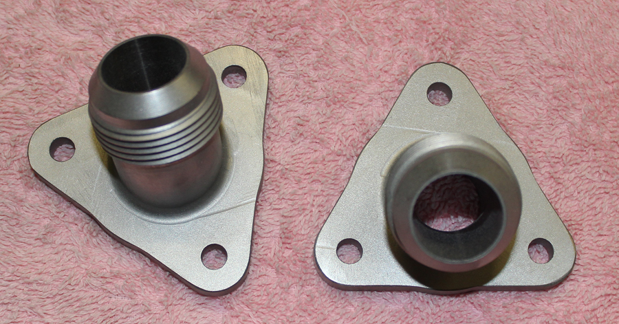 The newly machined carburetor fuel intake fittings. (photo via Tom Reilly) 