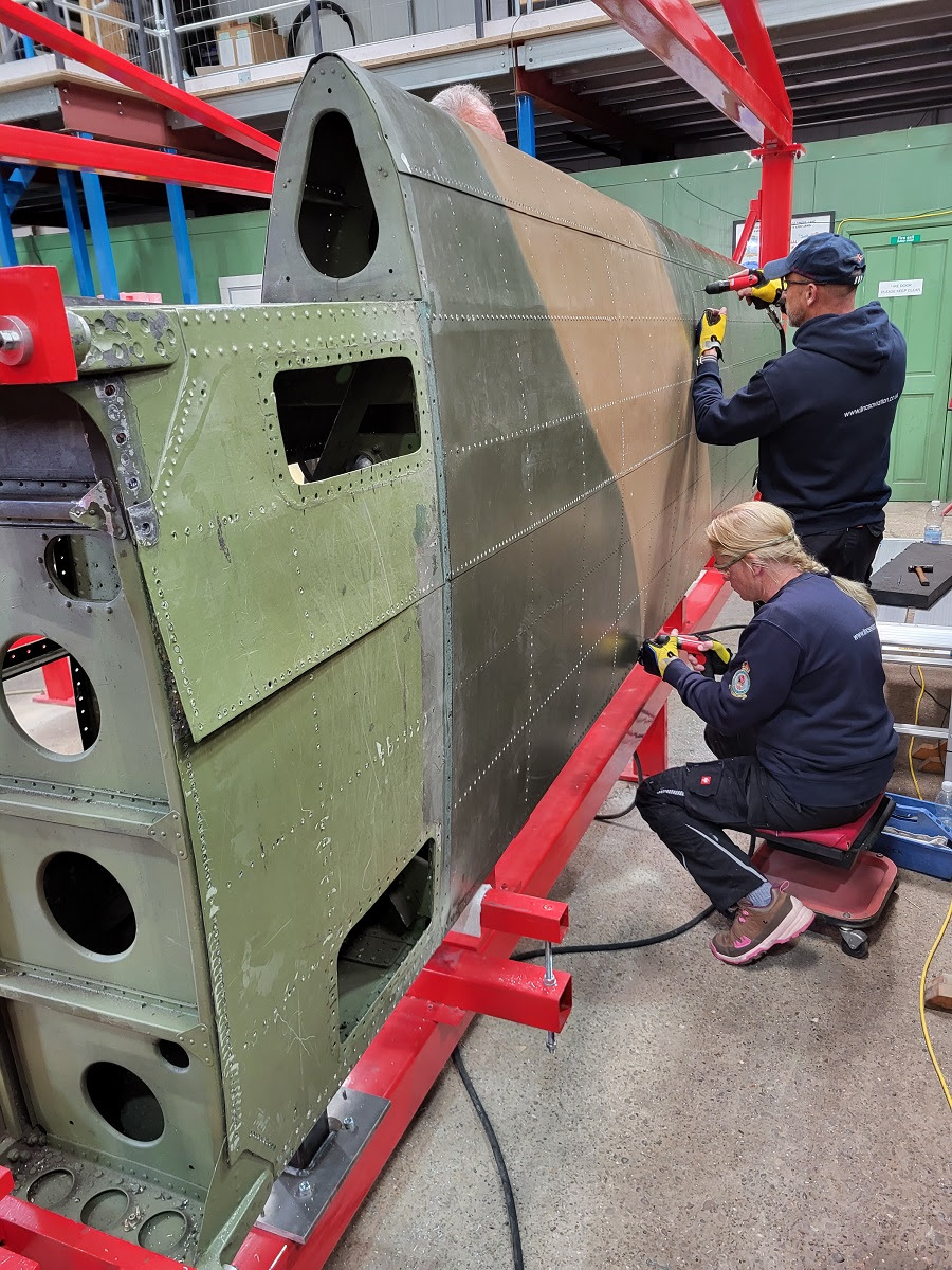 Chris Jodie and Gerald drilling out rivets on the port and starboard tailplanes