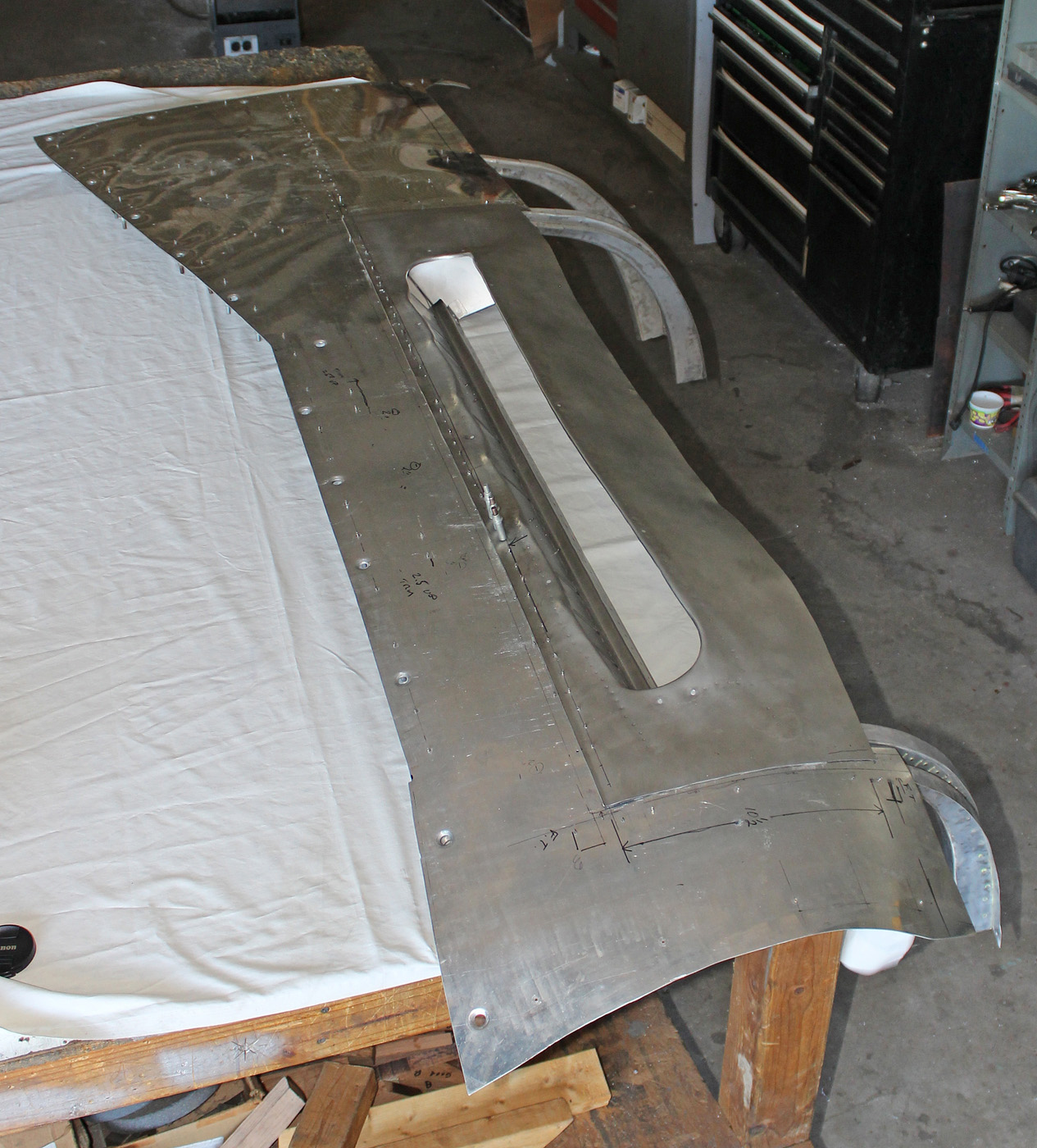 A view of the exhaust fairing going in from the outside of the cowling. (photo via Tom Reilly)